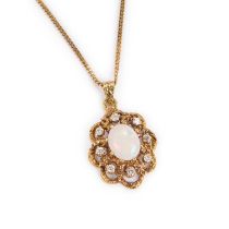 AN 18 CARAT GOLD OPAL AND DIAMOND PENDANT ON CHAIN