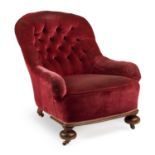 A VICTORIAN MAHOGANY AND UPHOLSTERED ARMCHAIR