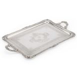 A LARGE GEORGE V SILVER TWO-HANDLED TEA TRAY