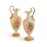 A PAIR OF ROYAL WORCESTER BLUSH IVORY EWERS, CIRCA 1903