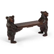 A 19TH CENTURY BLACK FOREST CARVED MUSCIAL BENCH