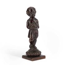 A 19TH CENTURY BRONZE FIGURE OF A CHILD HOLDING A BASKET OF FRUIT