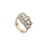 AN 18 CARAT GOLD DIAMOND CLUSTER DRESS RING