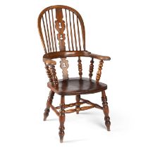 A 19TH CENTURY YORKSHIRE ELM AND OAK BROAD-ARM WINDSOR CHAIR