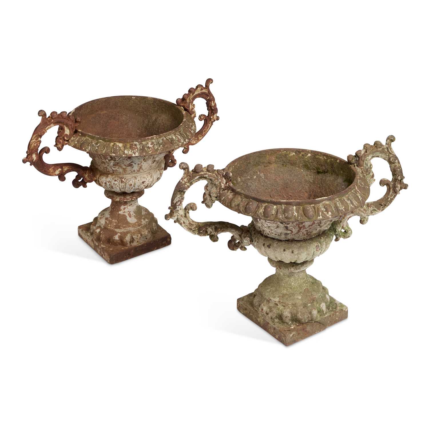 A PAIR OF 19TH CENTURY CAST IRON URNS