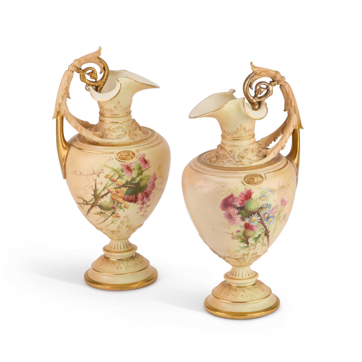 A PAIR OF ROYAL WORCESTER BLUSH IVORY EWERS, DATED 1898