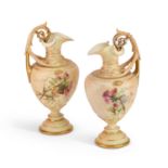 A PAIR OF ROYAL WORCESTER BLUSH IVORY EWERS, DATED 1898