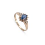 A 9 CARAT GOLD SAPPHIRE AND DIAMOND CLUSTER RING