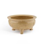 A CHINESE GREENWARE TRIPOD CENSER