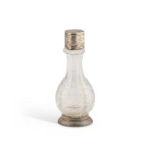 A CONTINENTAL SILVER-MOUNTED CUT-GLASS OIL BOTTLE