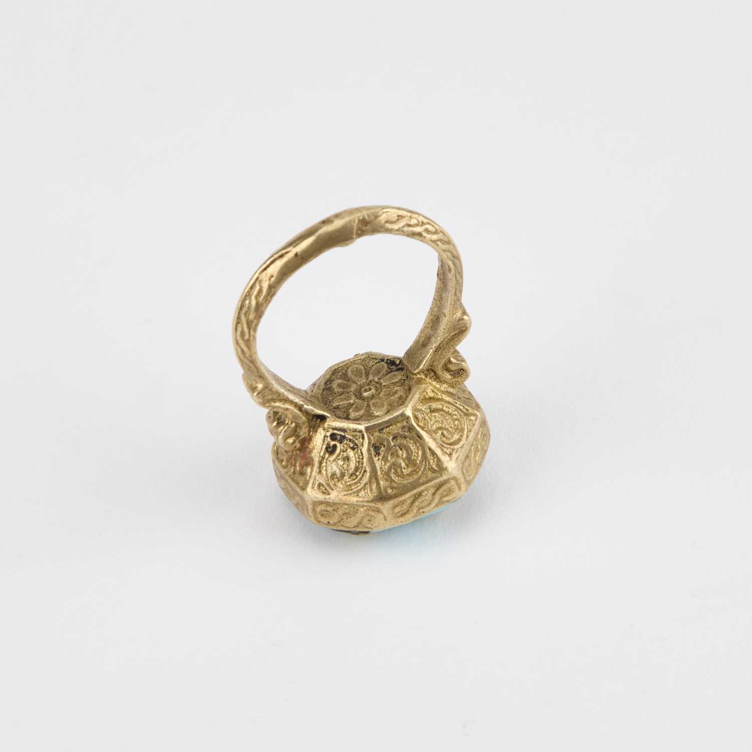 A PHOENICIAN STYLE RING AND A GILT-METAL BANGLE - Image 2 of 2