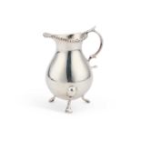 AN 18TH CENTURY RUSSIAN SILVER CREAM JUG