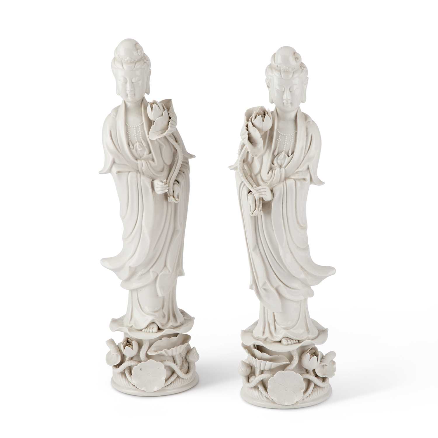 A LARGE PAIR OF CHINESE BLANC-DE-CHINE FIGURES OF GUANYIN