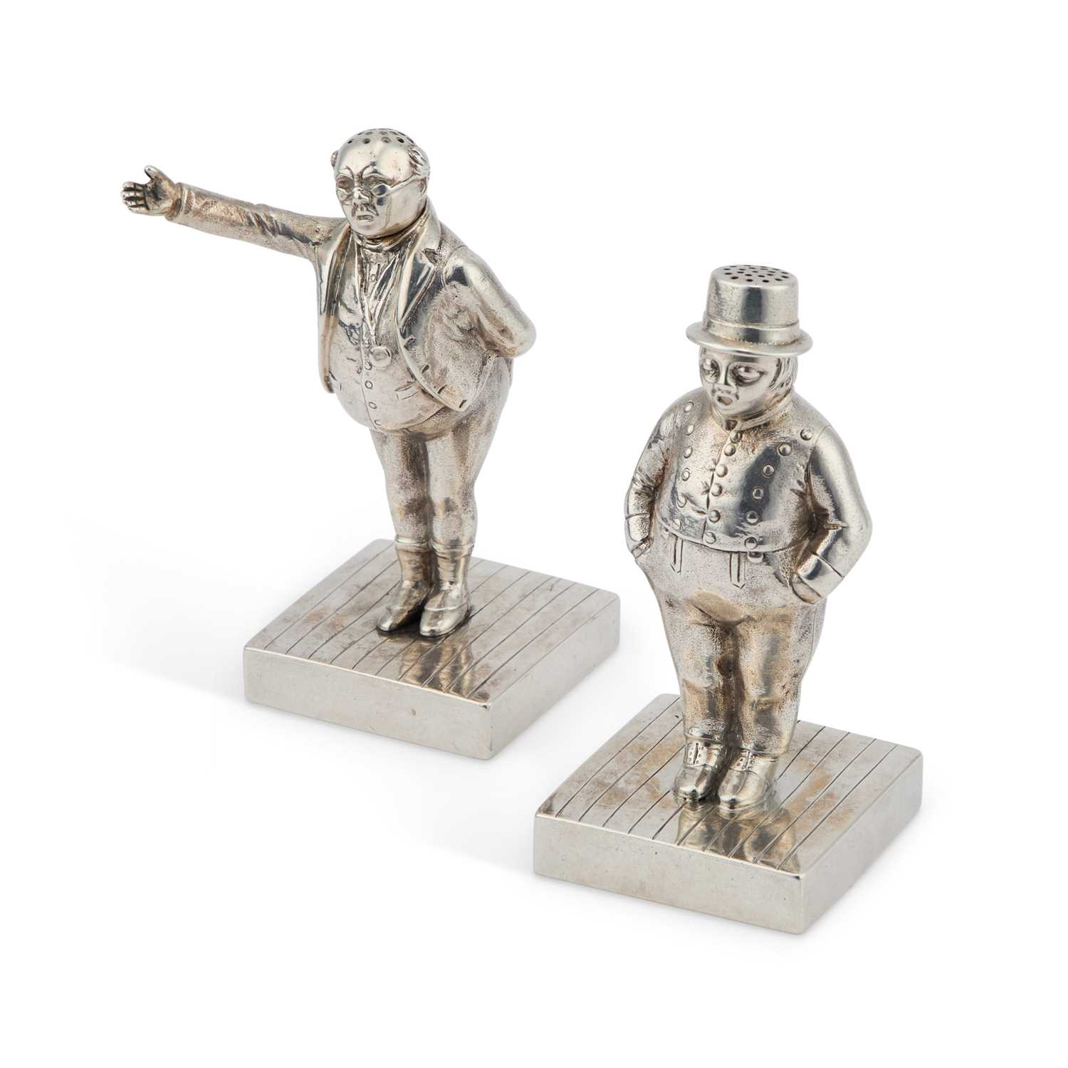A PAIR OF VICTORIAN SILVER NOVELTY DICKENSIAN FIGURAL PEPPER POTS