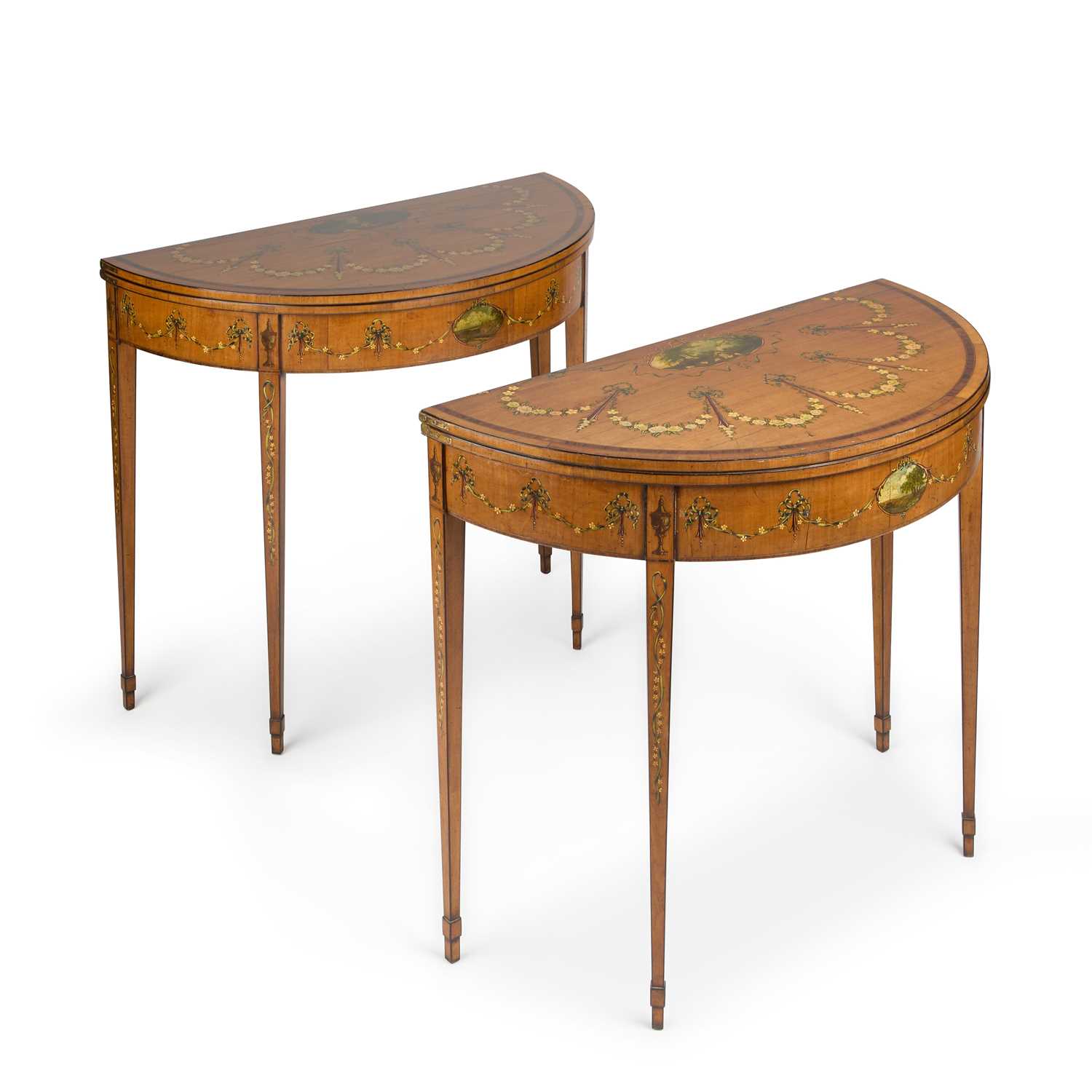 A PAIR OF 19TH CENTURY SHERATON REVIVAL PAINTED AND ROSEWOOD BANDED SATINWOOD CARD TABLES