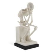 A COMPOSITE RESIN SCULPTURE OF A SKELETON