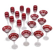 A SUITE OF RUBY AND CLEAR GLASS FLUTES AND WINE GLASSES
