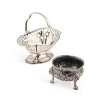 A SILVER-PLATED SALT TOGETHER WITH A SWING HANDLED BASKET