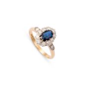 A SAPPHIRE AND DIAMOND RING