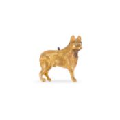 A YELLOW METAL DOG BROOCH