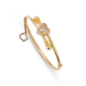 A LATE VICTORIAN MOONSTONE AND SEED PEARL BANGLE