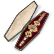 AN ELABORATE ENAMEL AND SEED PEARL BRACELET