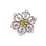 A LATE 19TH CENTURY PERIDOT AND DIAMOND BROOCH