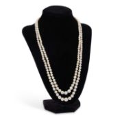 A NATURAL SALTWATER PEARL AND DIAMOND NECKLACE