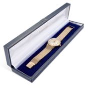A GENTS 9CT GOLD TISSOT BRACELET WATCH