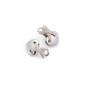 A PAIR OF 18 CARAT WHITE GOLD AND DIAMOND EARRINGS BY CHAUMET