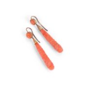 A PAIR OF CARVED CORAL EARRINGS