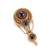 A LATE VICTORIAN GARNET-SET LOCKET BROOCH