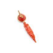A CARVED CORAL PENDANT