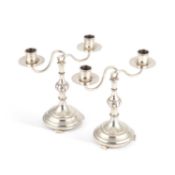A PAIR OF LATVIAN 84 ZOLOTNIK SILVER TWIN-LIGHT CANDELABRA