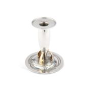 ARCHIBALD KNOX (1864-1933) FOR LIBERTY & CO, A TUDRIC PEWTER AND BRASS CANDLESTICK