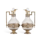 A PAIR OF FRENCH SILVER-GILT MOUNTED 'ARABESQUE' EWERS, IN LOUIS XVI STYLE