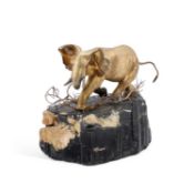 AN ELIZABETH II CAST SILVER-GILT MODEL OF AN ELEPHANT