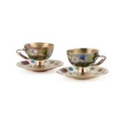 A FINE PAIR OF FRENCH SILVER AND ENAMEL CUPS AND SAUCERS