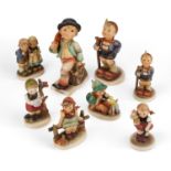 A GROUP OF EIGHT HUMMEL FIGURES