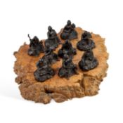 A SET OF NINE JAPANESE BRONZE FIGURES OF LUOHANS