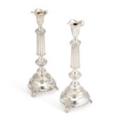 JUDAICA: A PAIR OF POLISH SILVER SABBATH CANDLESTICKS