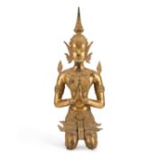 A THAI GILT-METAL FIGURE OF A KNEELING THEPPHANOM