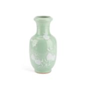 A CHINESE SLIP-DECORATED CELADON VASE