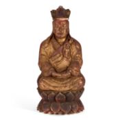 A LARGE CARVED GILTWOOD FIGURE OF BUDDHA