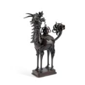 A CHINESE BRONZE KORO AS A KILIN, 18TH/ 19TH CENTURY