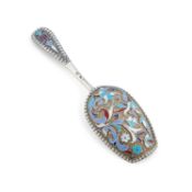 A RUSSIAN SILVER AND ENAMEL CADDY SPOON