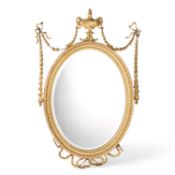 AN ADAM REVIVAL GILTWOOD OVAL MIRROR, 19TH CENTURY