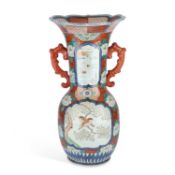 A JAPANESE IMARI PORCELAIN ALCOVE VASE