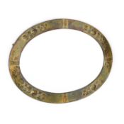 AN ARTS AND CRAFTS BRASS MIRROR