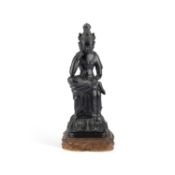 AN UNUSUAL BRONZE FIGURE OF THE SEATED KWANNON